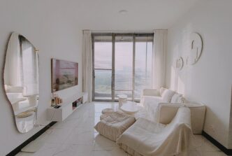 White apartment for rent with modern furniture and river view